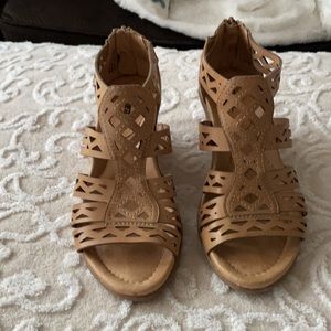 Earth tan wedge sandals with cutout patterned  straps